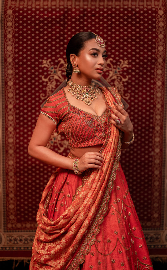 DESIGNER BRIDAL LEHENGA IN TANGERINE