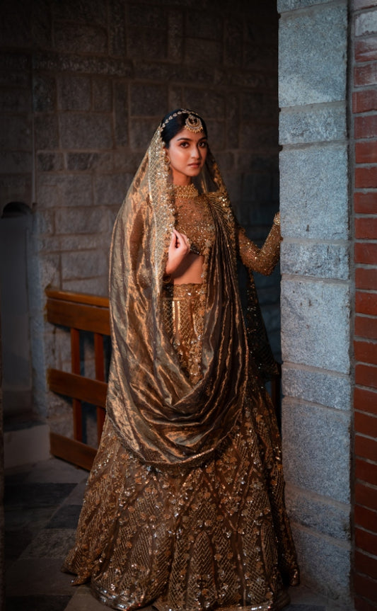 BRIDAL TULLE LEHENGA IN BROWN AND GOLD