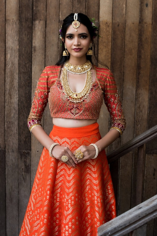 BRIDAL BANARAS LEHENGA IN TANGERINE